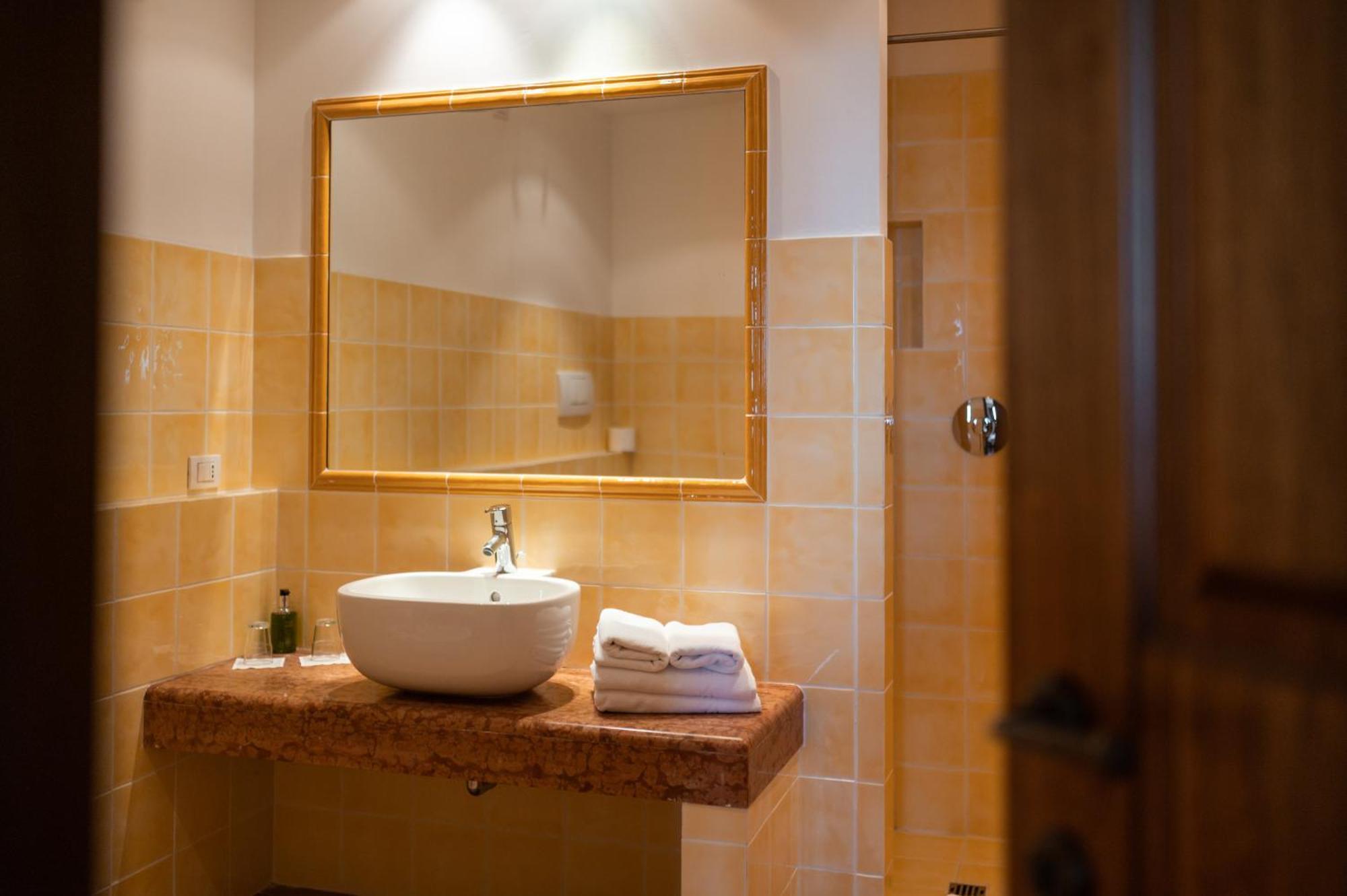 Apartmán Poggio Antico Monte San Vito Pokoj fotografie