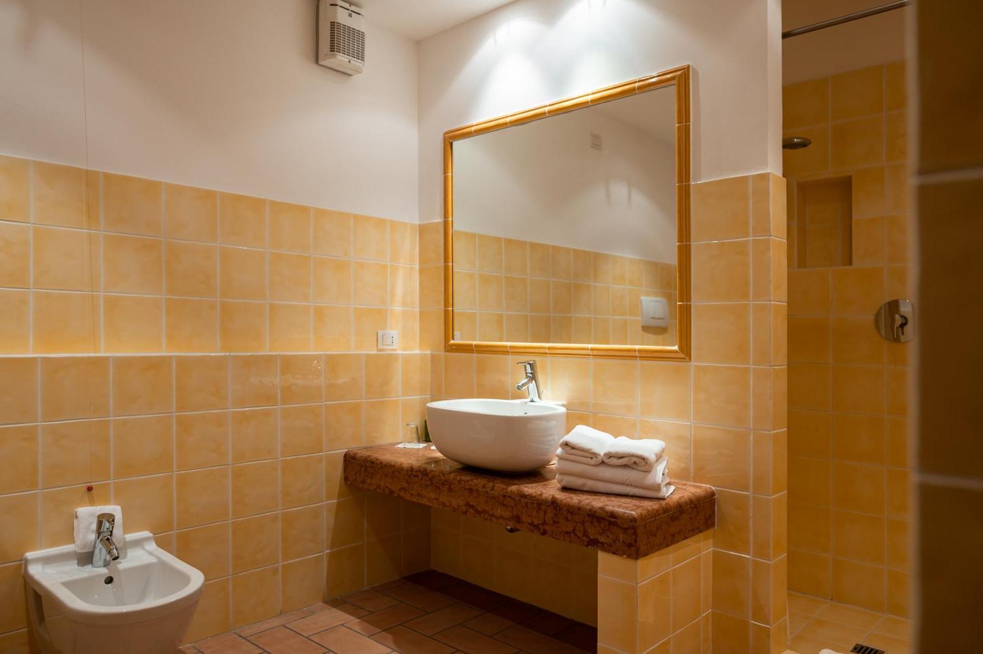 Apartmán Poggio Antico Monte San Vito Pokoj fotografie