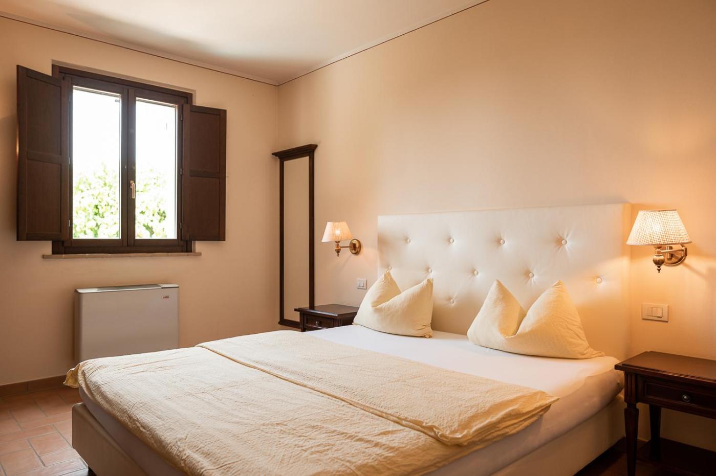 Apartmán Poggio Antico Monte San Vito Pokoj fotografie