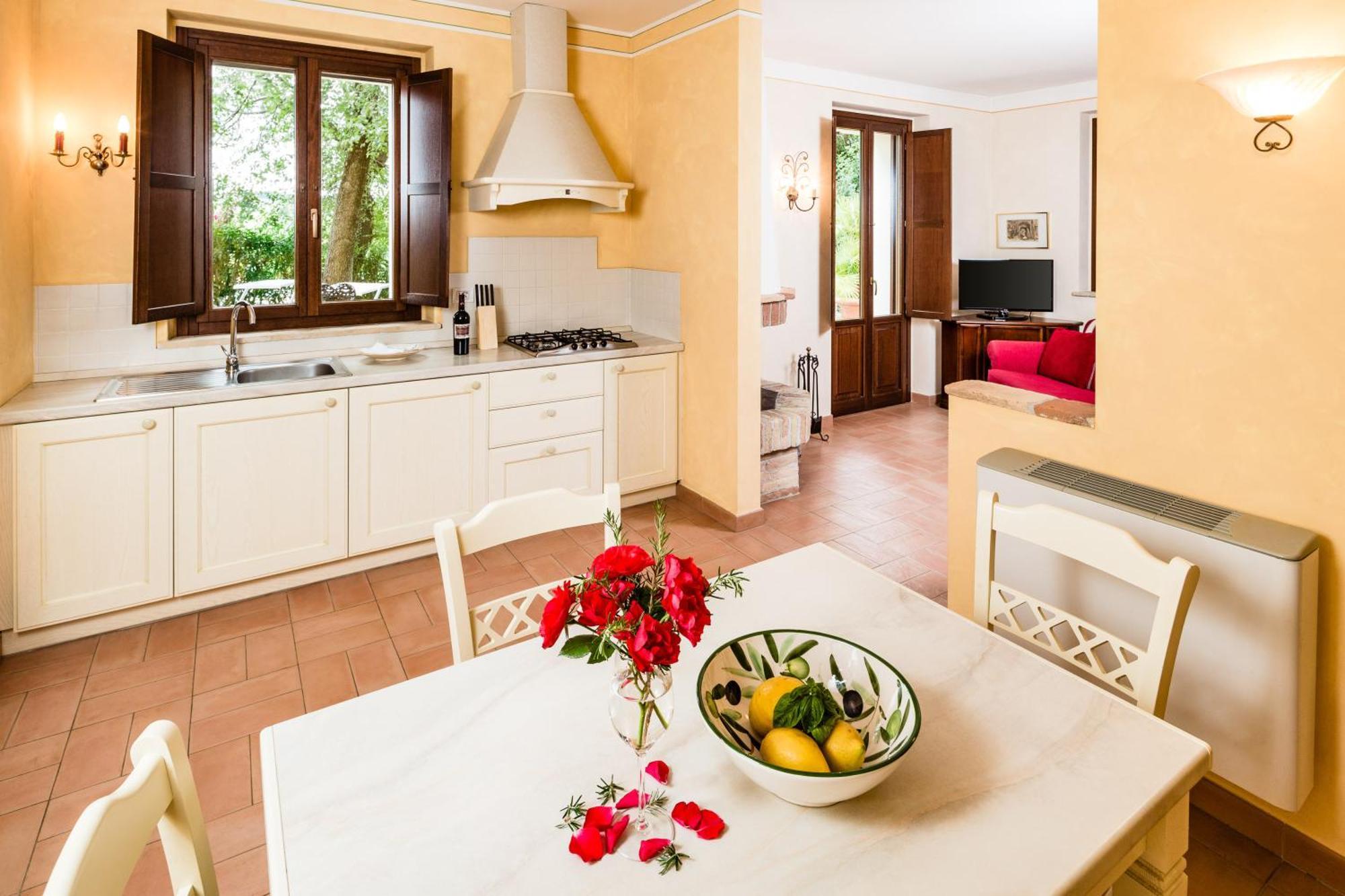 Apartmán Poggio Antico Monte San Vito Pokoj fotografie